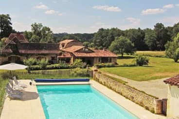 Lovely farmhouse with two holiday rentals, heated pool and stunning view.