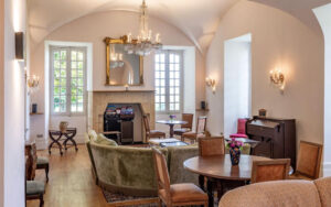Elegant living room in luxury Dordogne holiday home with classic decor.