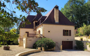 Charming luxurious Dordogne holiday home surrounded by trees and nature.