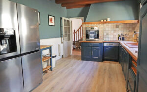 Modern kitchen in a luxurious Dordogne holiday home with stylish cabinetry and appliances.