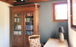 Cozy reading nook in French countryside home.