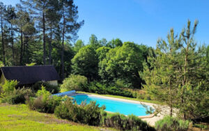 Beautiful luxury vacation home with private pool in Dordogne's scenic forest setting. Perfect for relaxing stays.