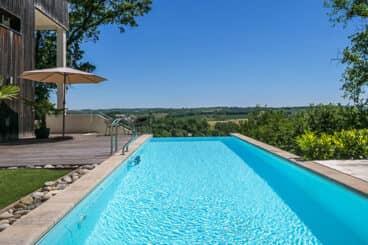 Spectaculaire moderne architecten villa met verwarmde infinity pool, veel comfort, privacy en een magnifiek weids uitzicht. 8 personen